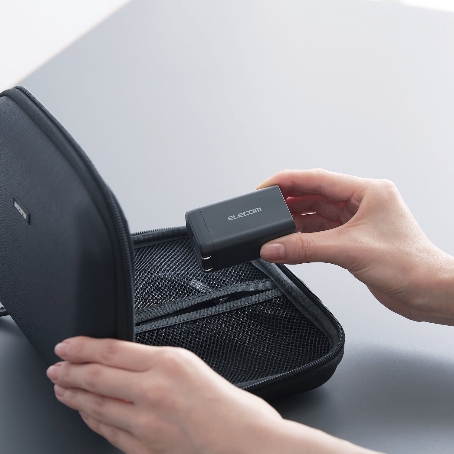 compact travel charger with foldable plug to eliminate wasted space - black wall charger with 3 ports for USB A and USB C