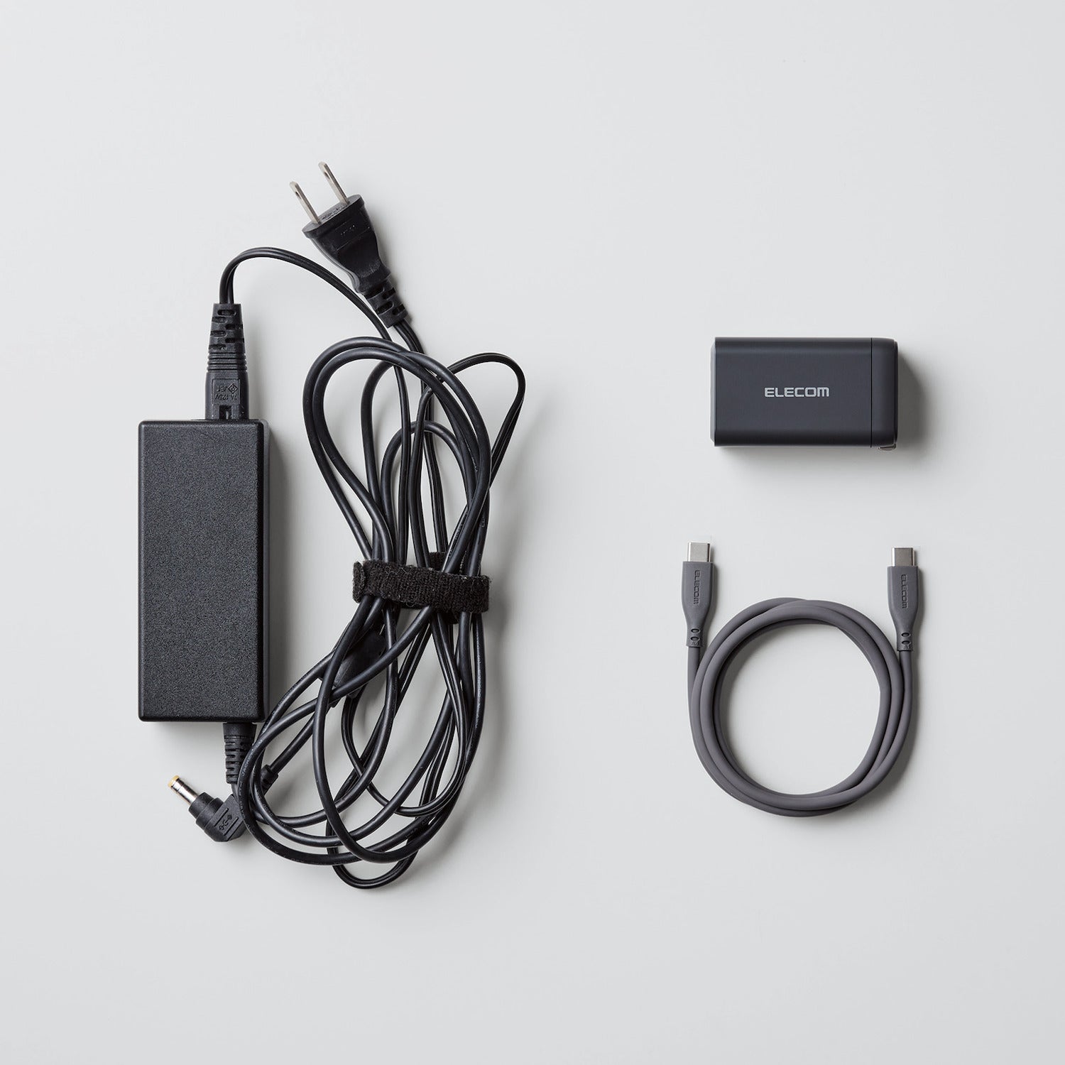 before and after of messy laptop cord and compact charger with smooth cord - usb c chargers for phones and laptops