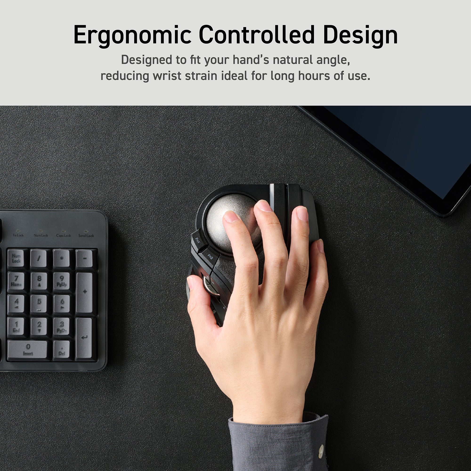 Hand operating HUGE PLUS trackball mouse on a clean workspace text reads "ergonomic controlled design, designed to fit your hand's natural angle, reducing wrist strain ideal for long hours or use."