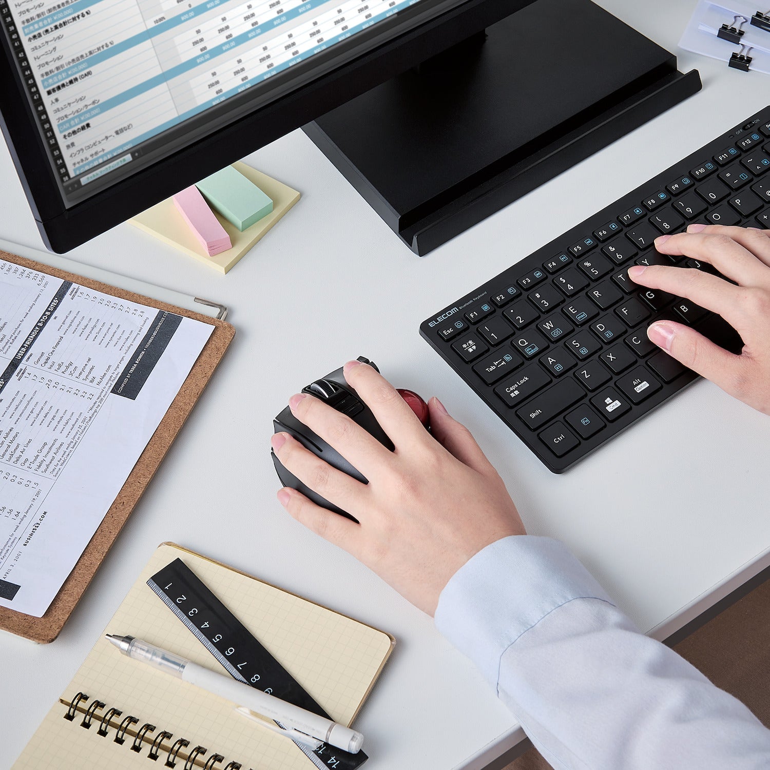 Left-handed office worker using trackball mouse and keyboard | Left-Handed Wireless Trackball Mouse