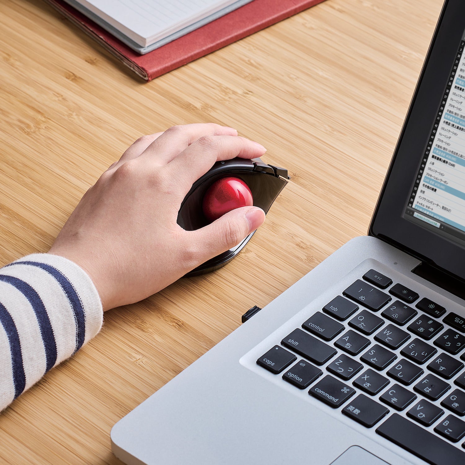 Left-handed person using trackball mouse with laptop | Left-Handed Wireless Trackball Mouse