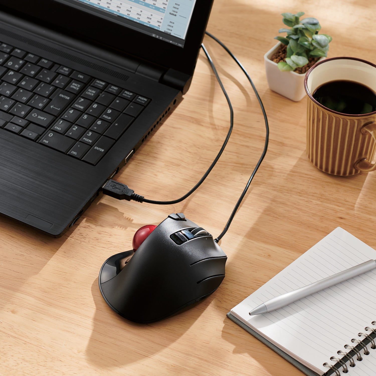 Black EX-G Trackball Wired Red Ball connected to a laptop on a desk | Elecom Wired Trackball mouse