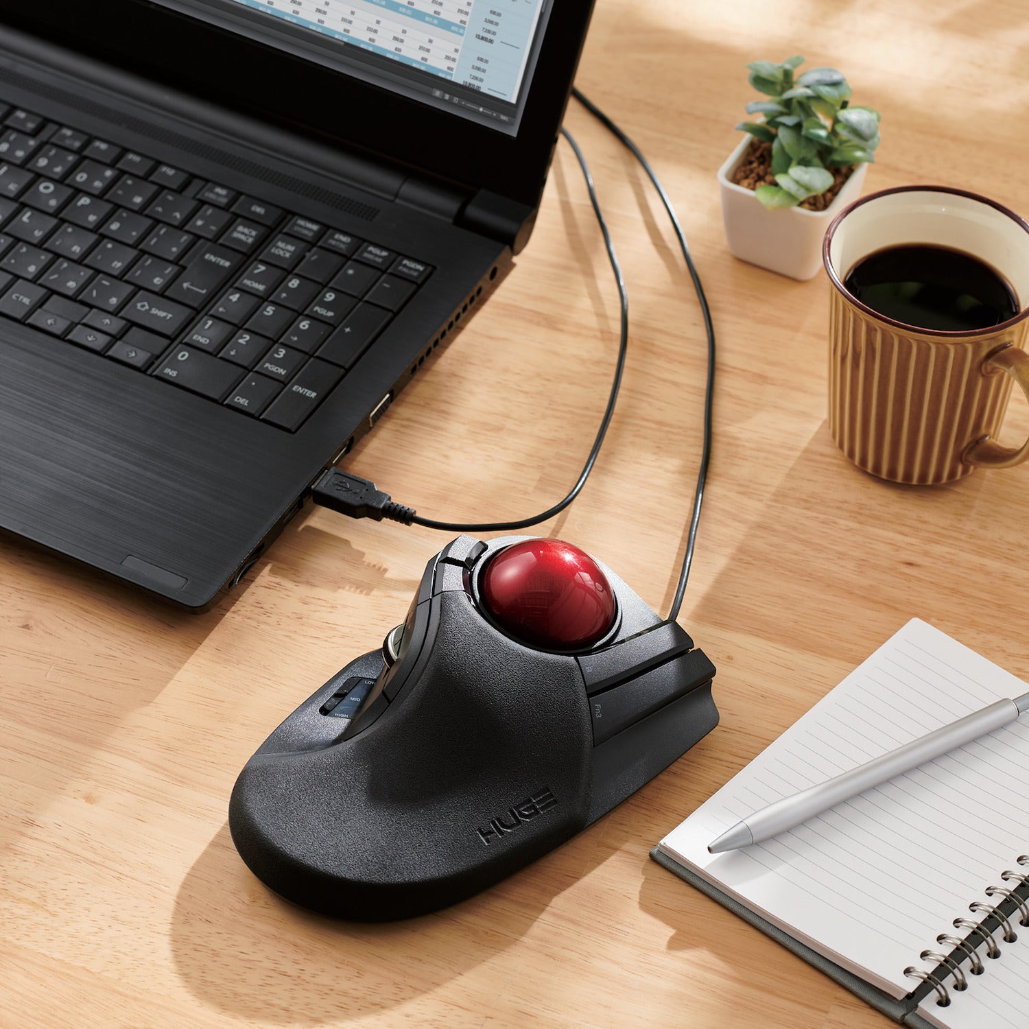 Huge Wired Trackball Mouse Red Ball connected to laptop on a table with notepad | Elecom Wired Huge Trackball Mouse