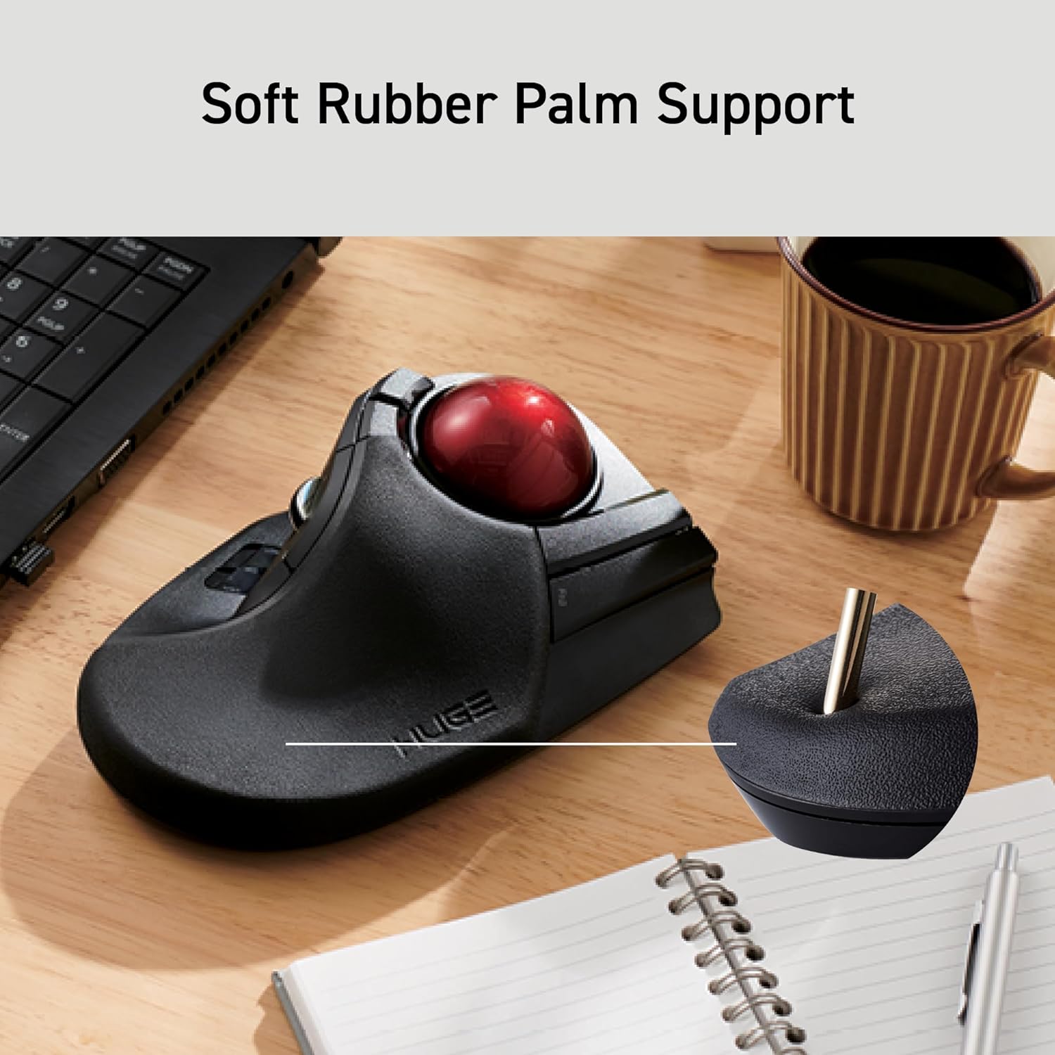 Huge Wireless USB Trackball Mouse Red Ball on wooden table next to part of a laptop, notepad, and coffee mug small circle closeup of the soft comfort part of mouse | Message reads: Soft Rubber Palm Support