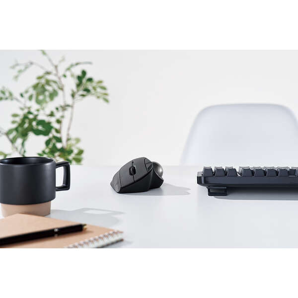 front view of a black bluetooth trackball | best trackball mouse | lifestyle image on white desk with black coffee mug | ball mouse | ergonomic mouse | trackball mouse wireless