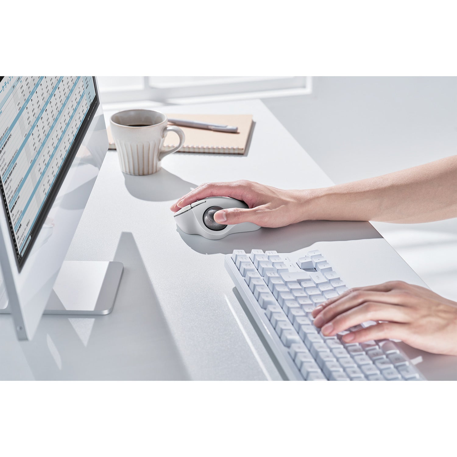 white computer trackball mouse and attachments | integrations for faster workflow experience