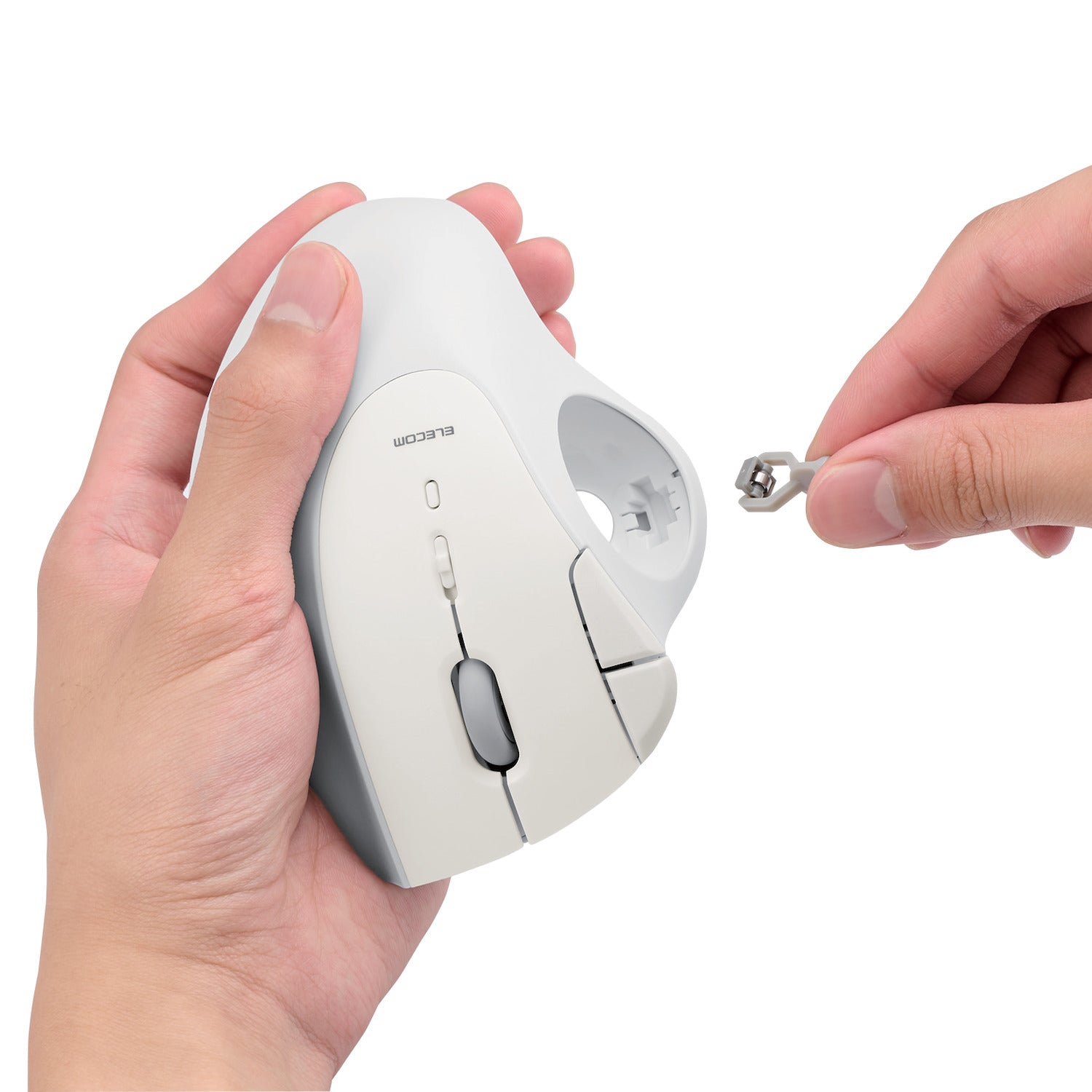 white mouse demonstration of interchangeable bearing system for RollMaster or Ruby Red Elecom bearings | IST Ergonomic trackball to alleviate carpal tunnel pain